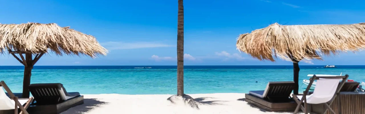 Gili Island Beach at Bagno Di Gili. Idyllic waters and comfortable beach gazebos